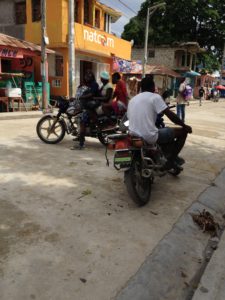 Motor bike taxis provide transport and an income for their drivers