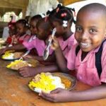 School children enjoying a meal